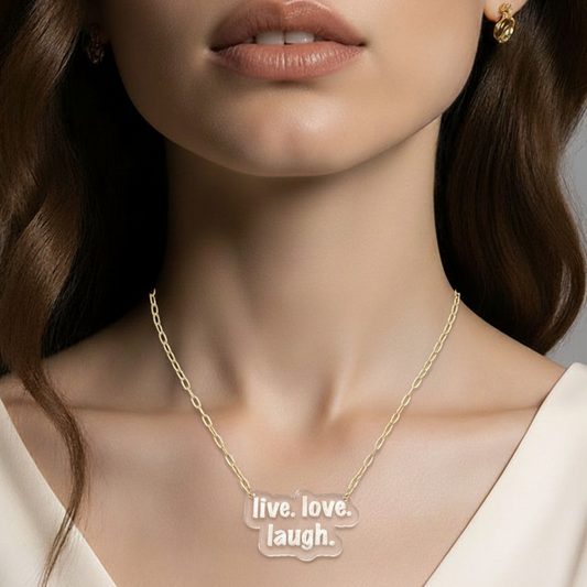 Necklace with 'live. love. laugh.' pendant worn by a model